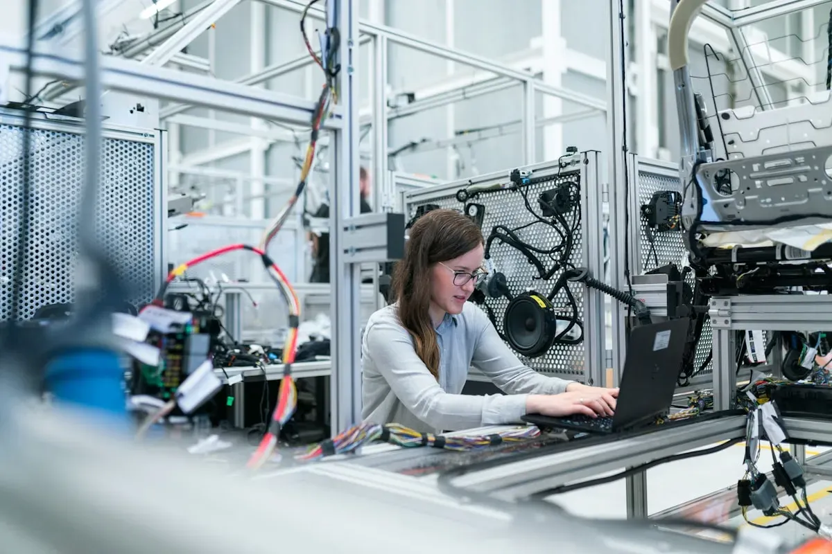 Engineer analyzing material samples in industrial laboratory setting