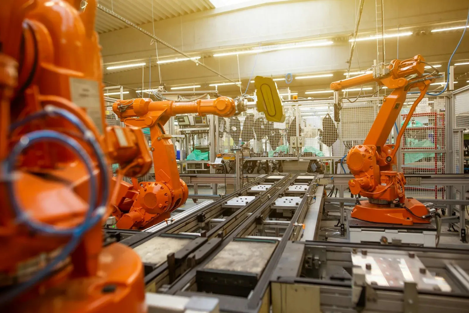 CNC machine with digital monitoring display showing real-time production data