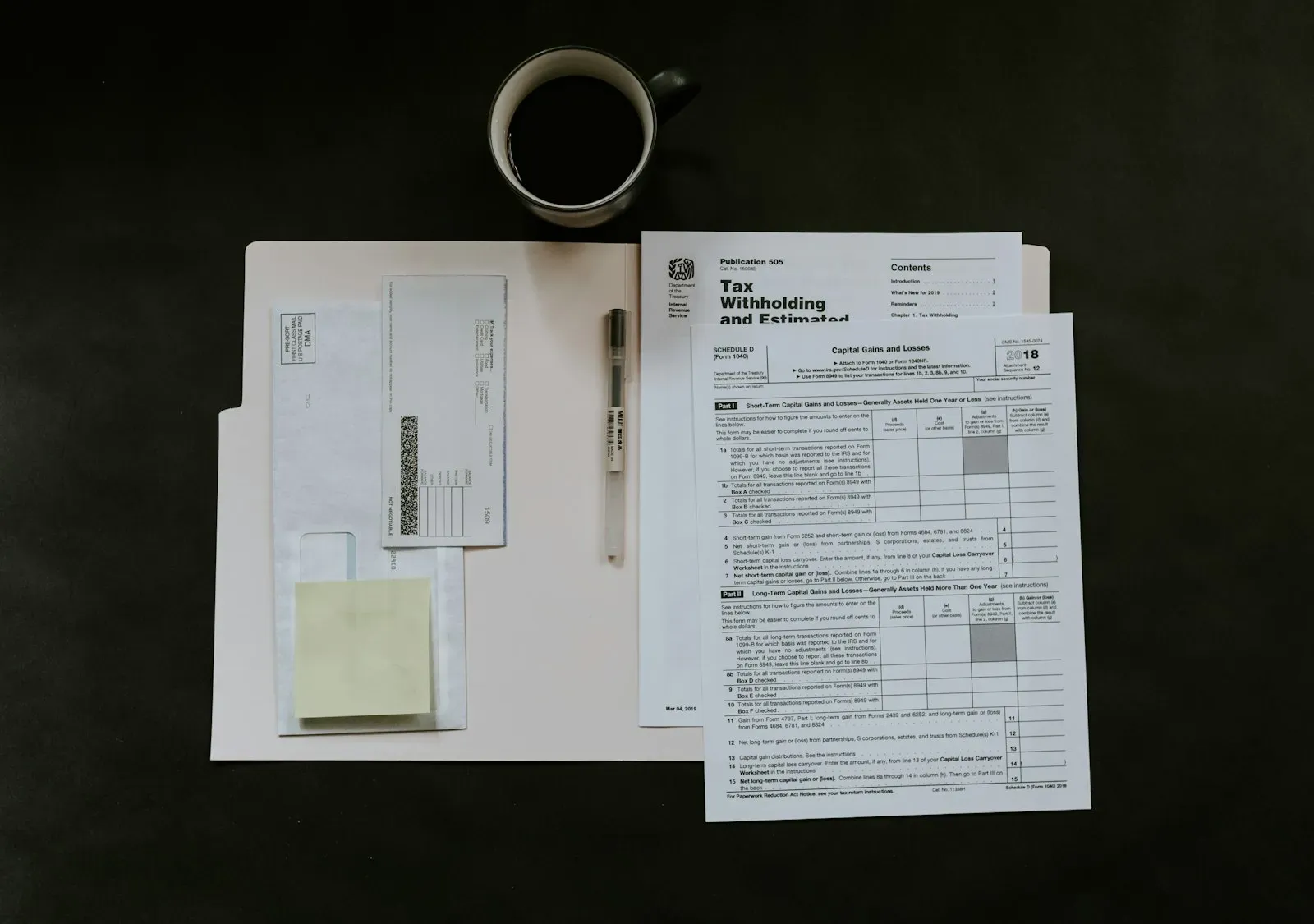 Material documentation and certification papers on desk
